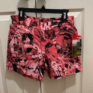 Brand new The North Face girls size M flash dry shorts